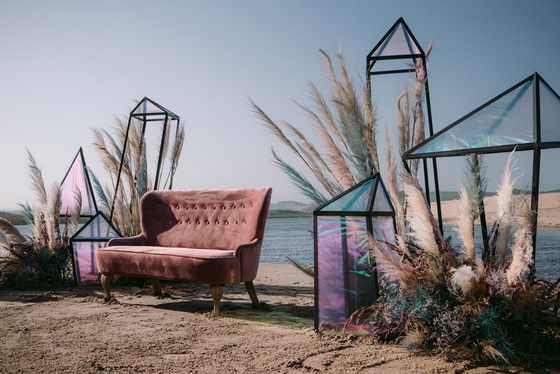 Pampas grass beach installation with geometric frames